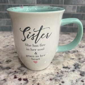 Sister has fire in her soul and grace in her heart mug